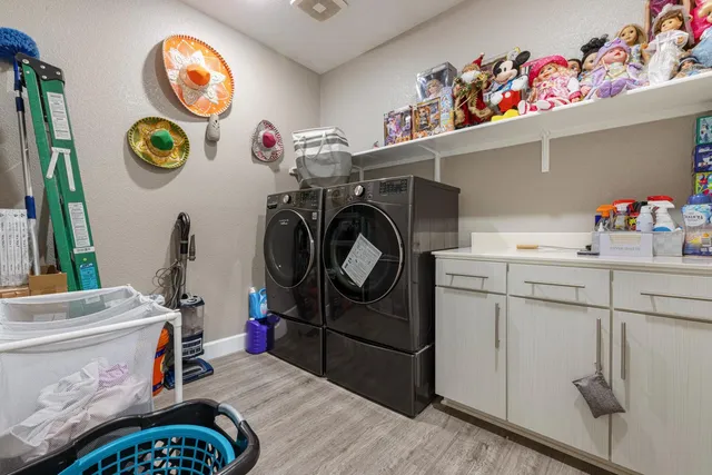 a white toilet sitting next to a shower