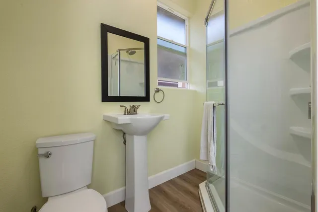a view of chairs in patio with a table and chairs