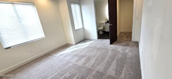 a view of a room that has a window in it