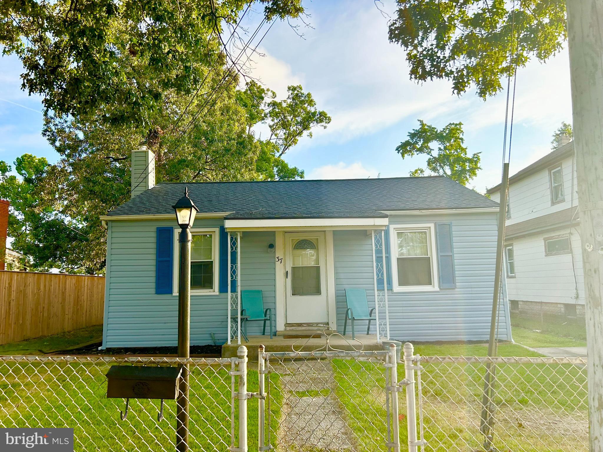 37 Walkern Road Baltimore, MD 21221 - Photo 1 of 41 front view of a house with a yard