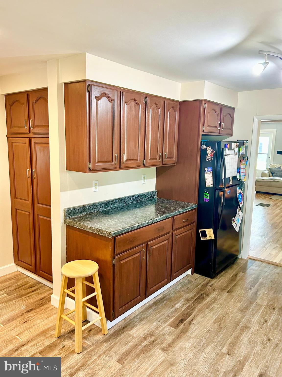 37 Walkern Road Baltimore, MD 21221 - Photo 16 of 41 a kitchen with granite countertop a refrigerator stove top oven and sink