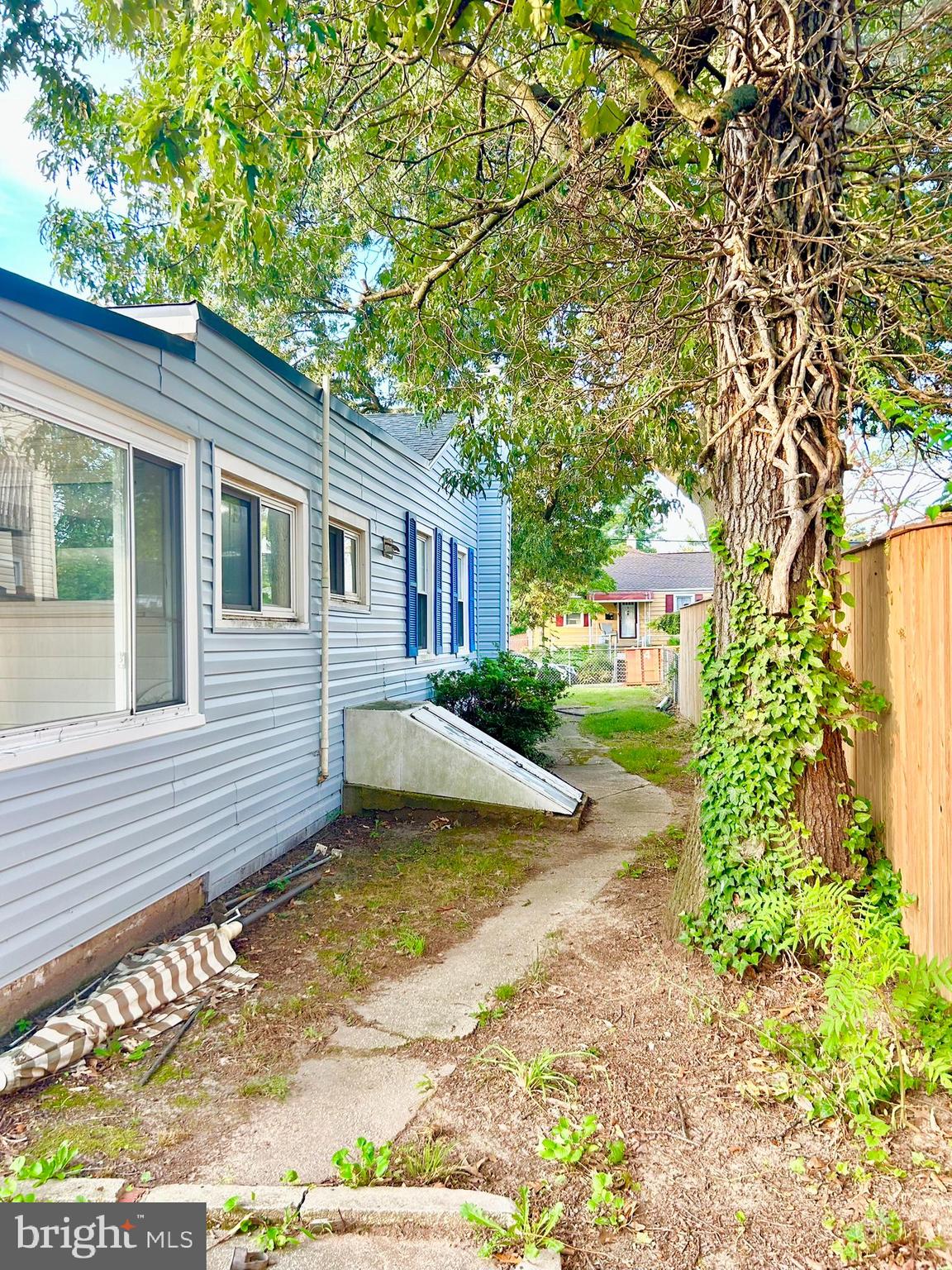 37 Walkern Road Baltimore, MD 21221 - Photo 23 of 41 a view of a house with a yard