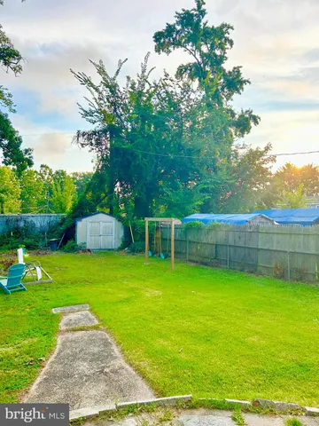a view of a backyard with a garden