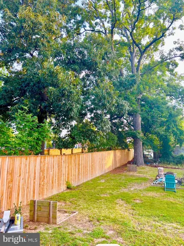 a view of swimming pool with a patio