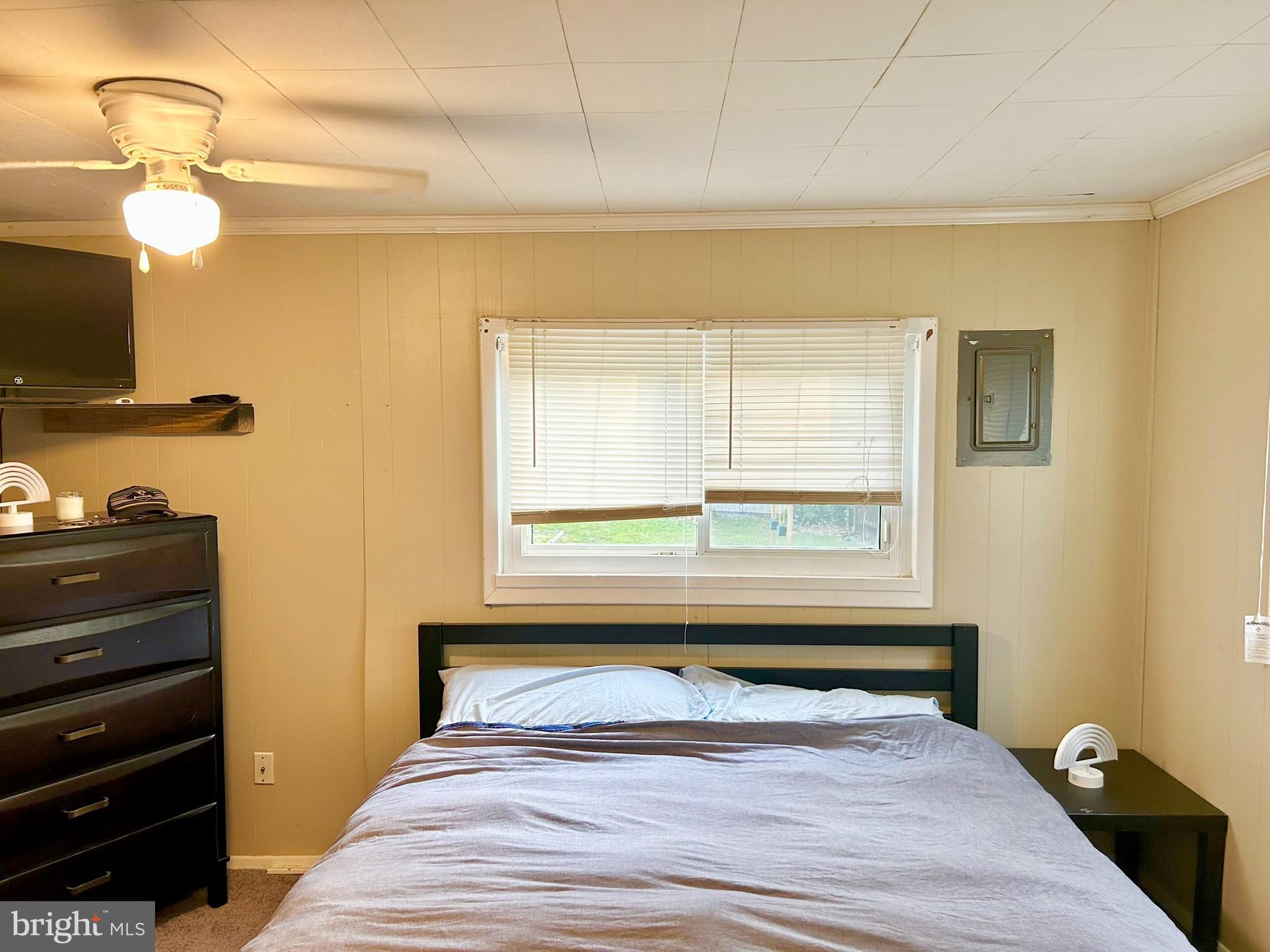 37 Walkern Road Baltimore, MD 21221 - Photo 28 of 41 a bedroom with a bed and a window