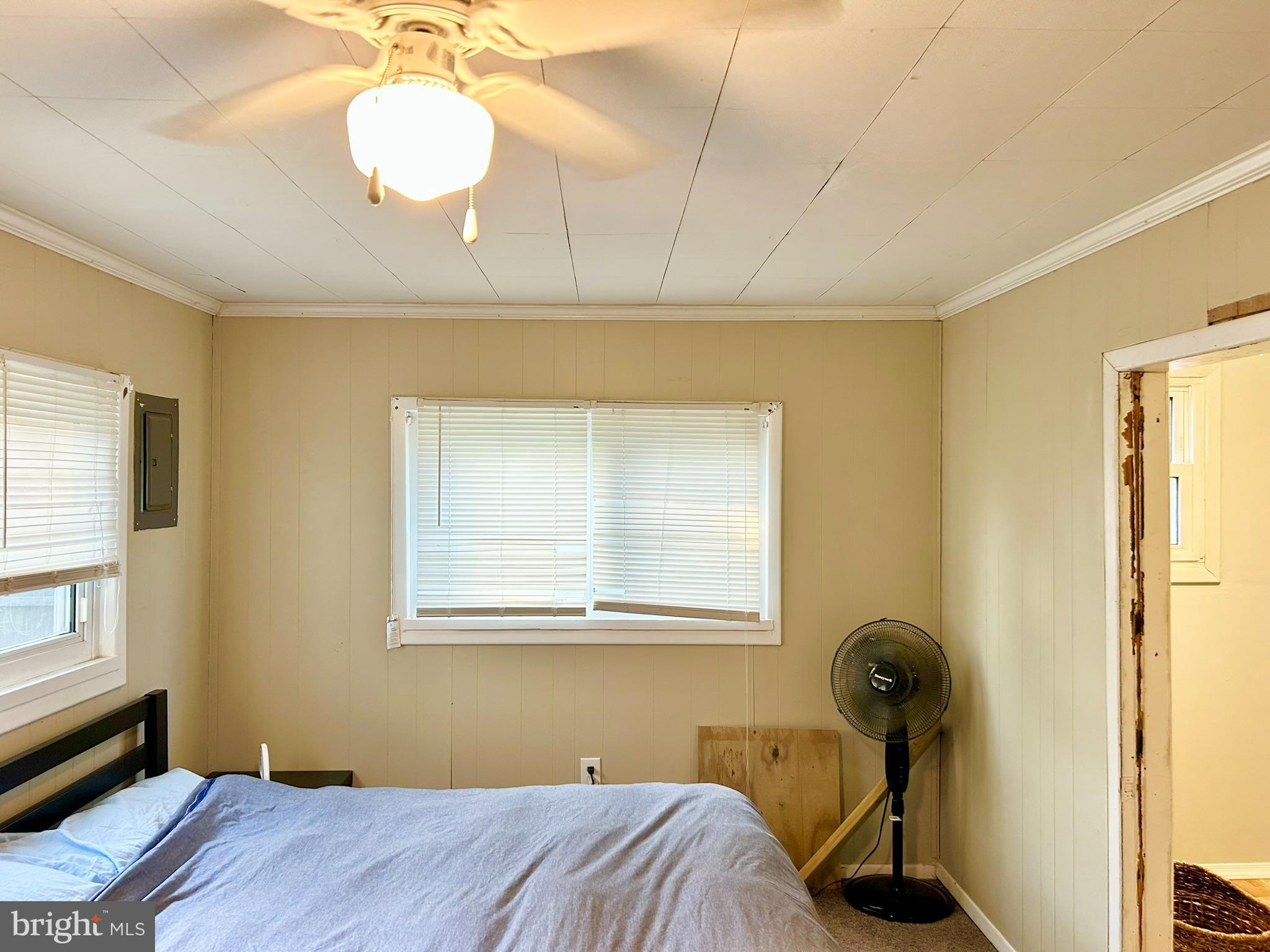 37 Walkern Road Baltimore, MD 21221 - Photo 29 of 41 a bedroom with a bed and a window