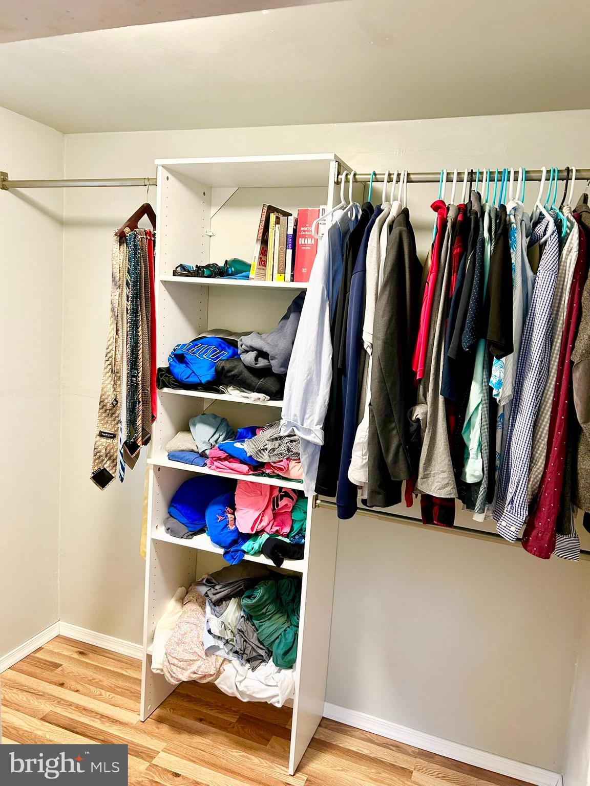 37 Walkern Road Baltimore, MD 21221 - Photo 35 of 41 a view of walk in closet with clothes and shoes