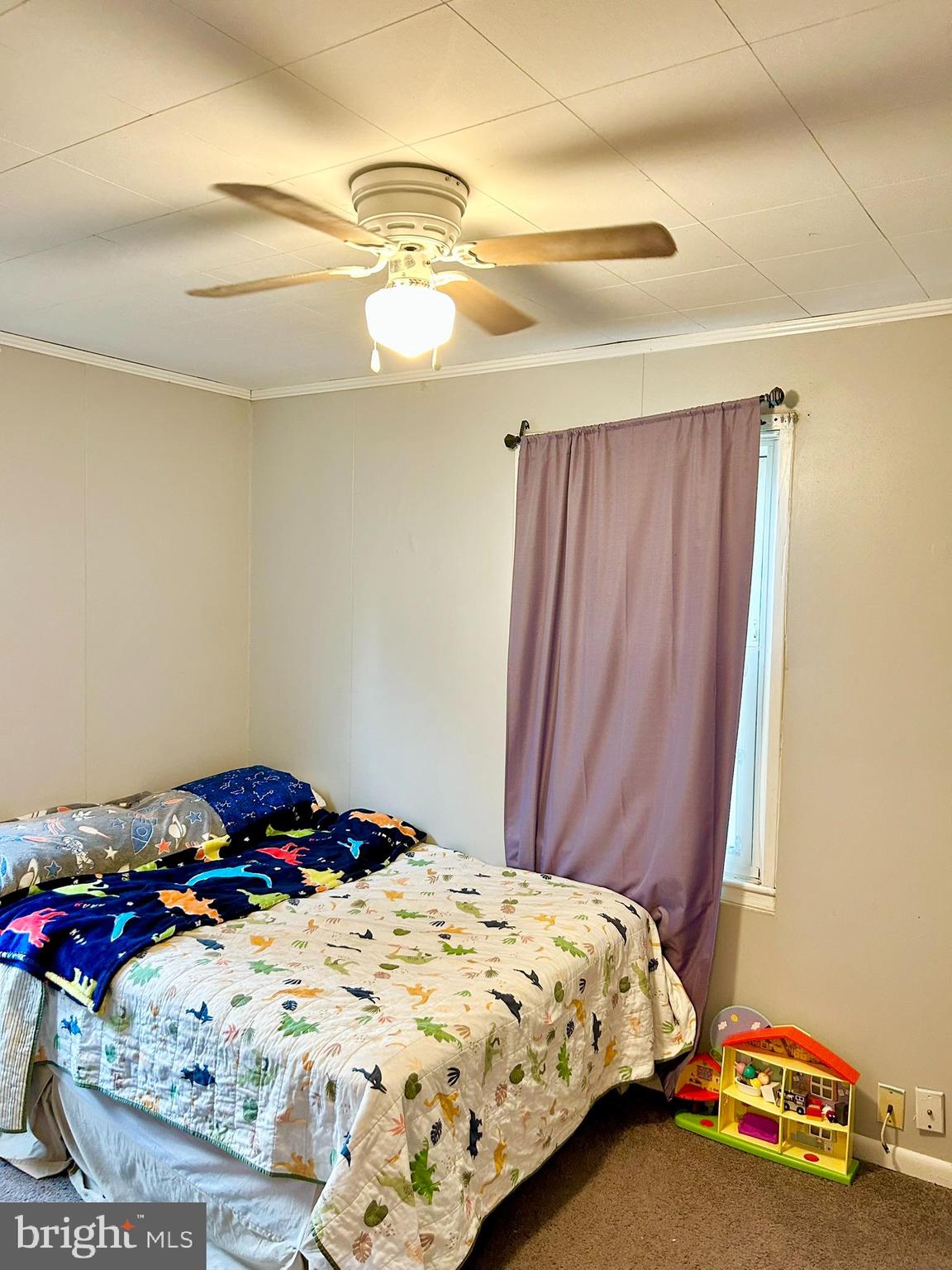 37 Walkern Road Baltimore, MD 21221 - Photo 38 of 41 a bedroom with a bed and a chandelier