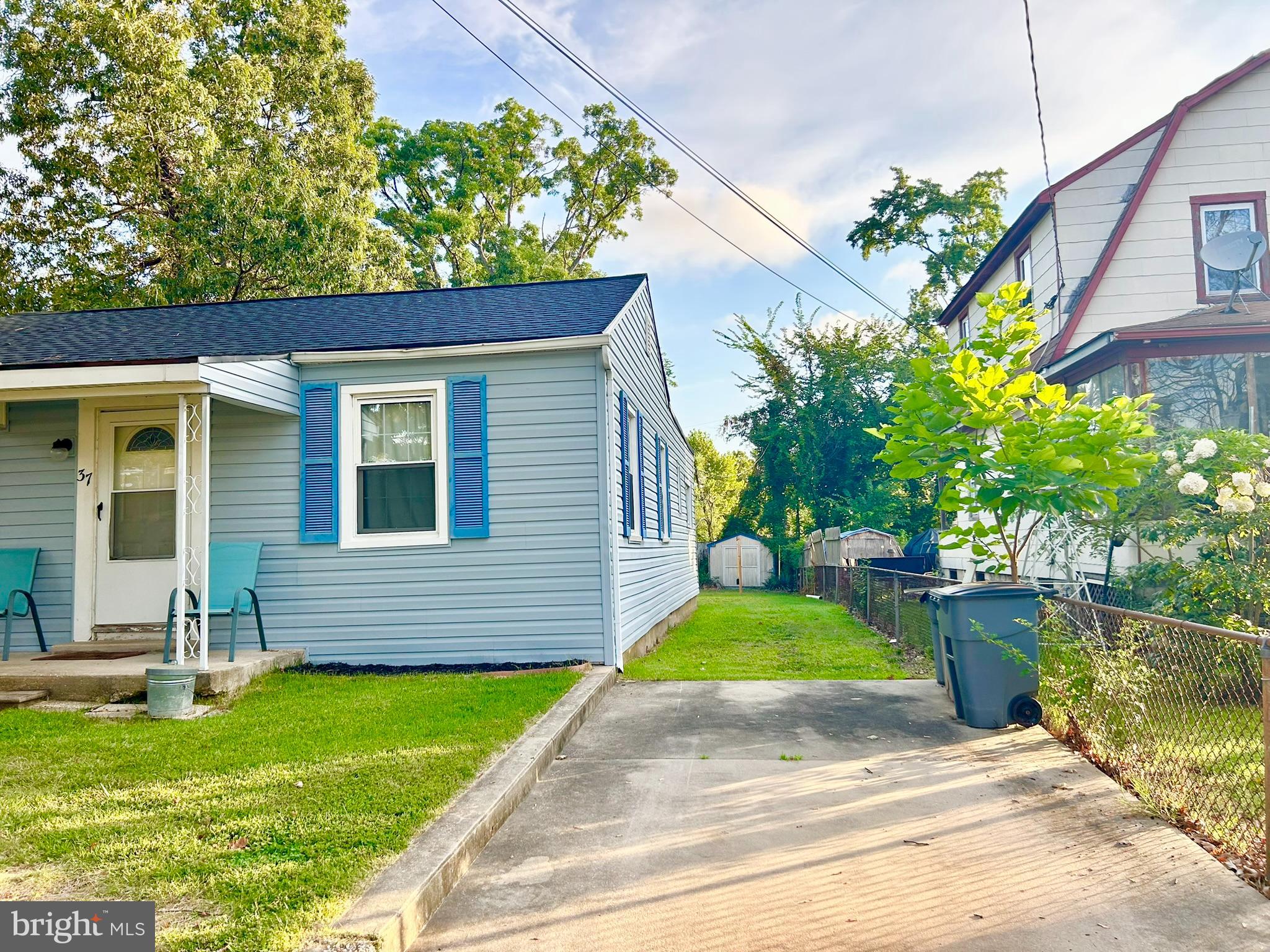 37 Walkern Road Baltimore, MD 21221 - Photo 6 of 41 a front view of a house with a yard