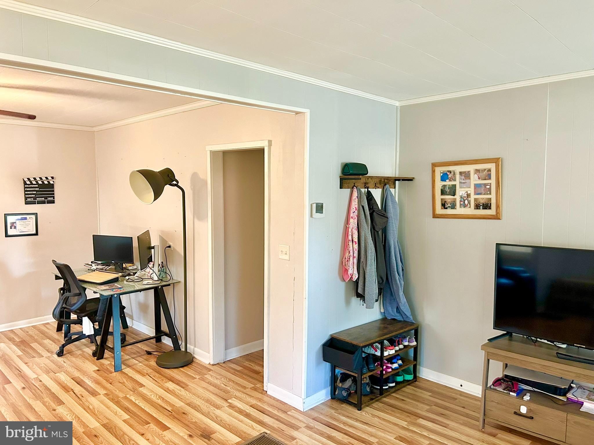37 Walkern Road Baltimore, MD 21221 - Photo 9 of 41 a living room with furniture and a flat screen tv