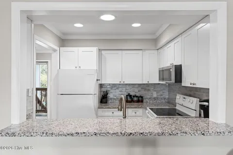 $539,500 | 31 Foxfire Trace, Caswell Beach, NC 28465