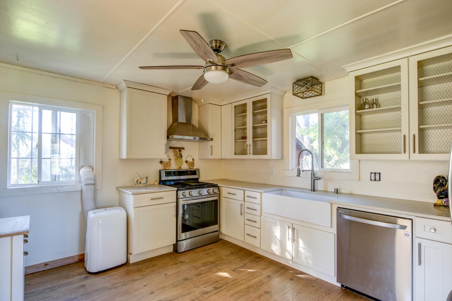 5700 Semor Drive Shingle Springs, CA 95682 - Photo 14 of 92 a kitchen with a stove a sink and a microwave