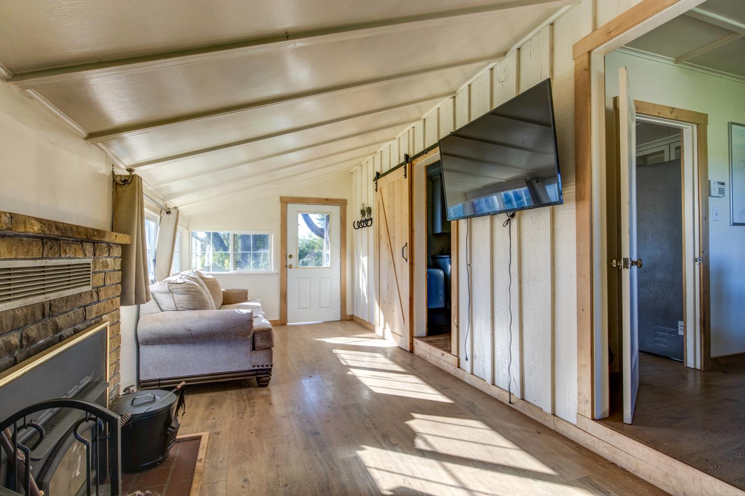 5700 Semor Drive Shingle Springs, CA 95682 - Photo 10 of 92 a living room with furniture and a floor to ceiling window