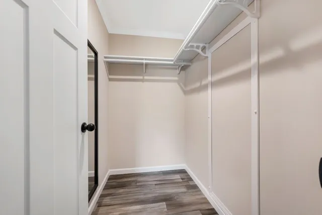 a view of an empty walk in closet