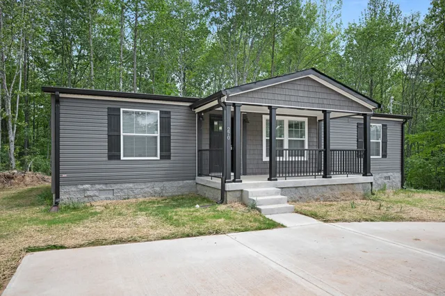 a backyard of a house with seating space