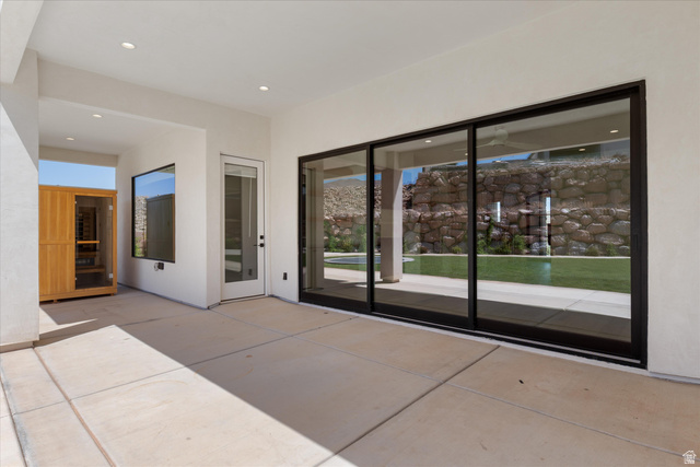 1192 East Corral Way Washington, UT 84780 - Photo 58 of 81 Covered patio featuring concrete flooring and a built-in sauna unit