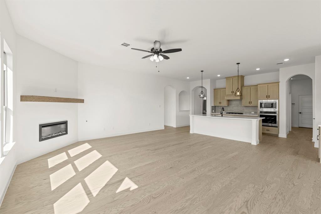 610 Tenor Drive Forney, TX 75126 - Photo 8 of 30 a view of a kitchen with furniture and a kitchen