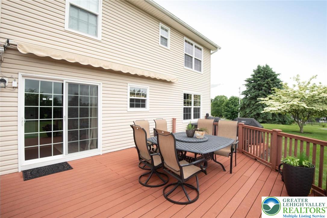 576 Batts Switch Road Nazareth, PA 18064 - Photo 29 of 39 deck features a retractable awning for added shade