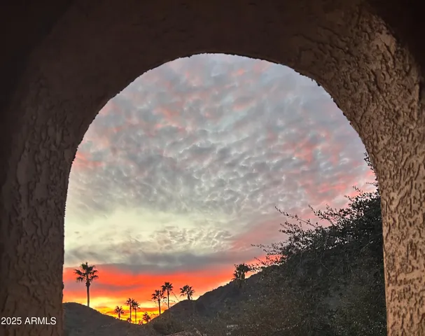 a kitchen with cabinets and window