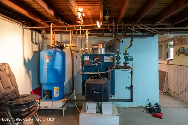 a room with lots of furniture and clutter