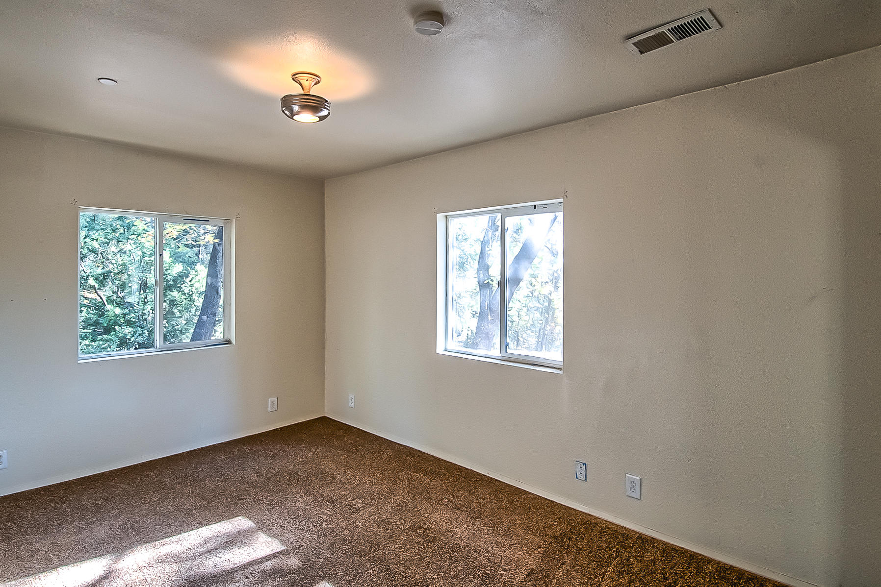 14681 Fern Road Whitmore, CA 96096 - Photo 18 of 37 a view of an empty room with a window