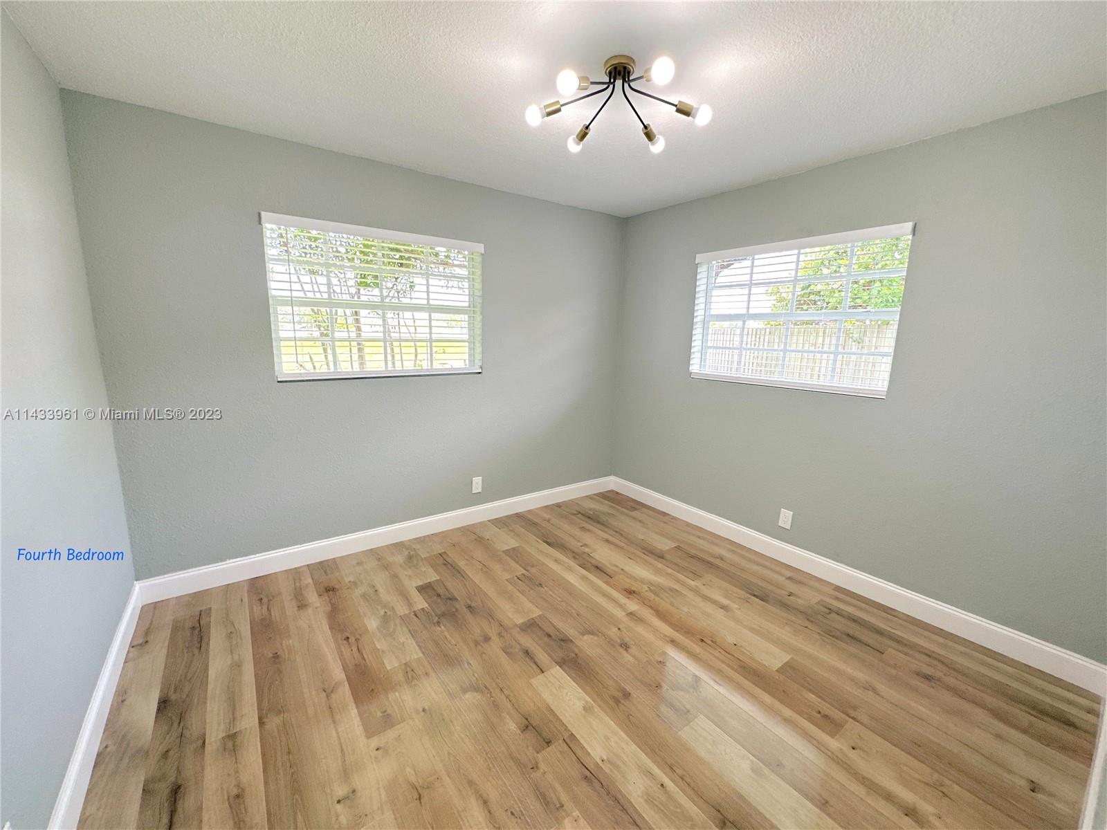 1460 Southwest 3rd Terrace Deerfield Beach, FL 33441 - Photo 60 of 100 a view of empty room with a window