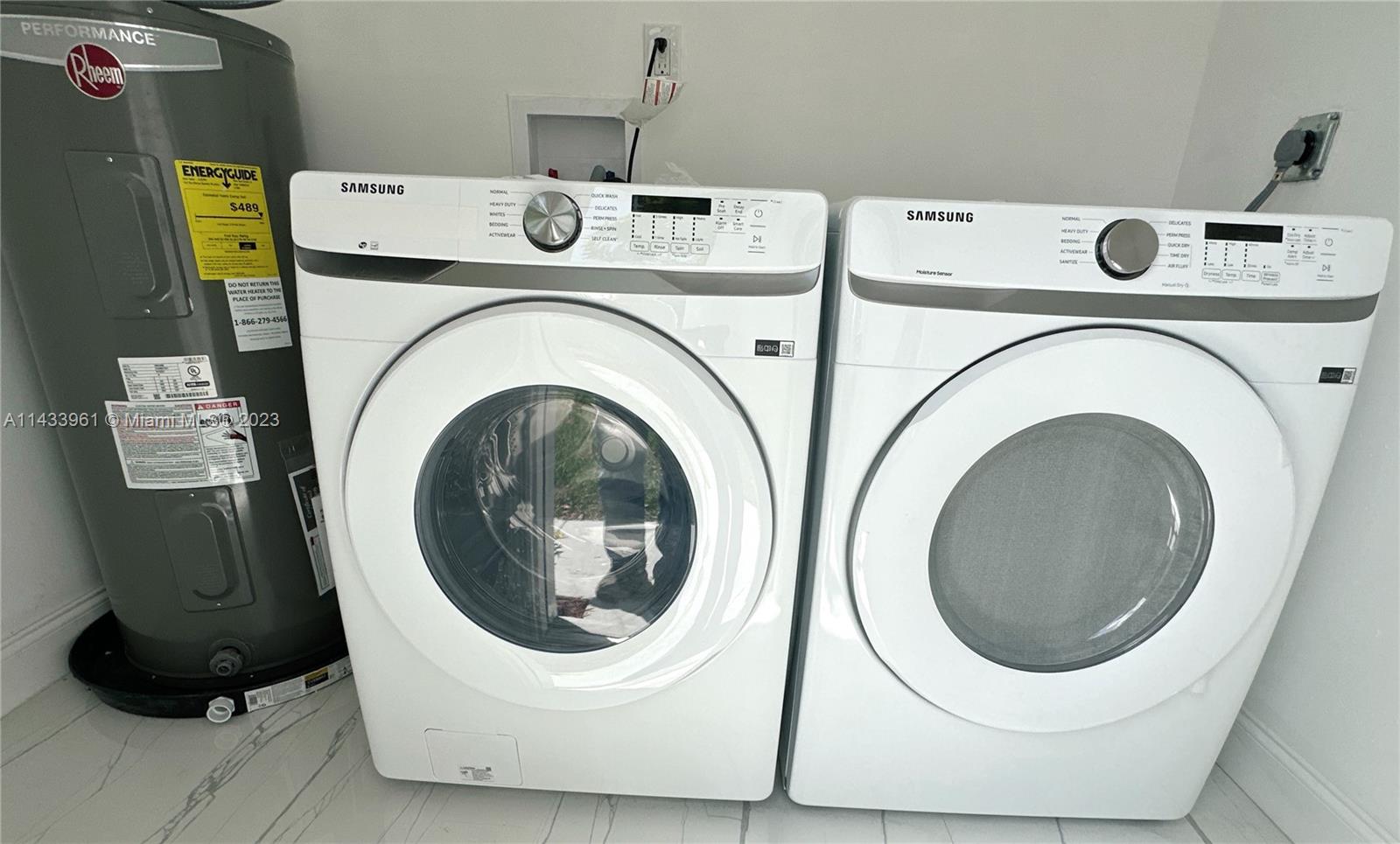 1460 Southwest 3rd Terrace Deerfield Beach, FL 33441 - Photo 87 of 100 a utility room with dryer and washer