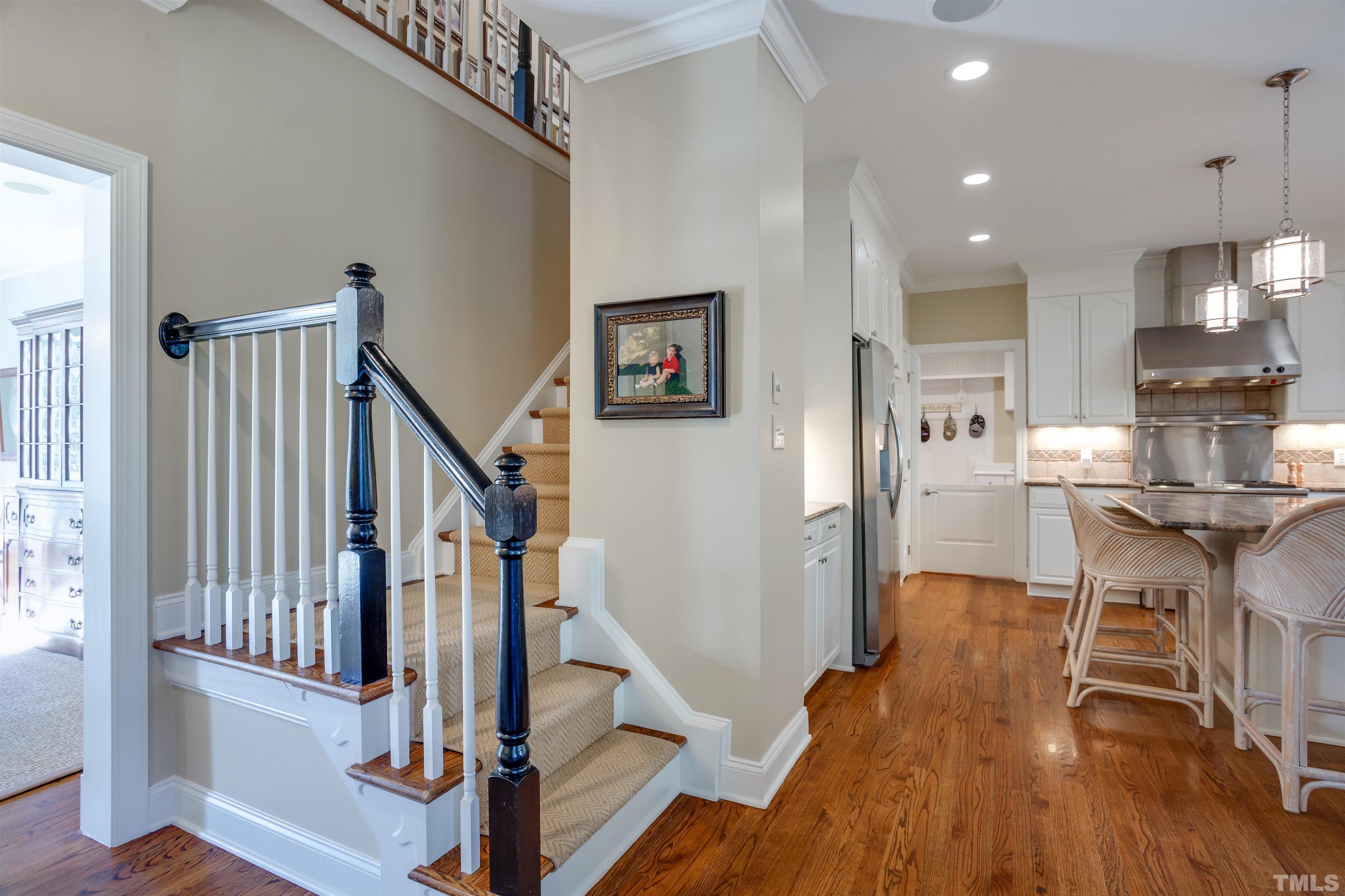9004 Shellwood Court Raleigh, NC 27617 - Photo 13 of 30 a view of entryway and hall with wooden floor