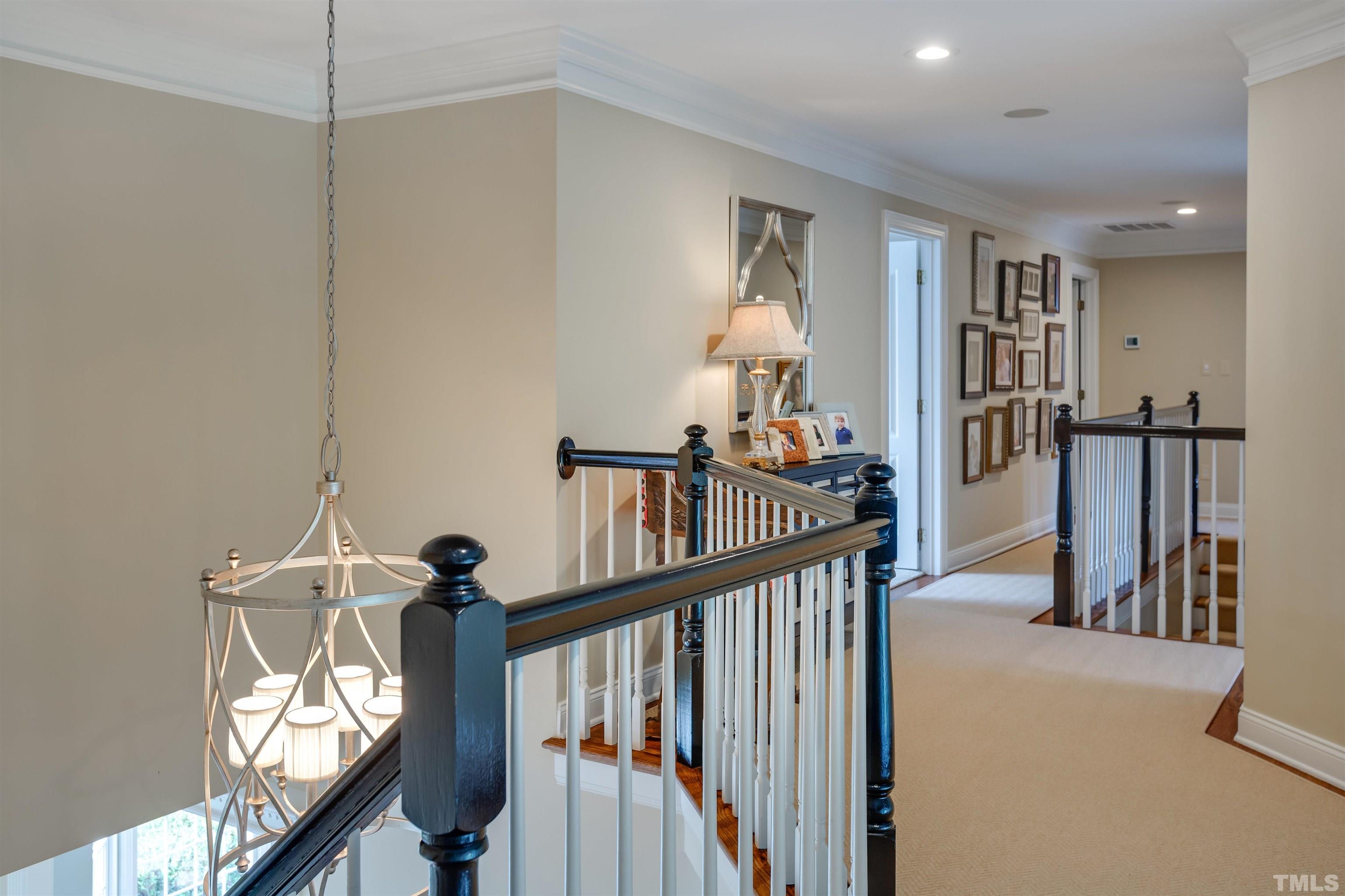9004 Shellwood Court Raleigh, NC 27617 - Photo 16 of 30 a view of a hallway view with staircase