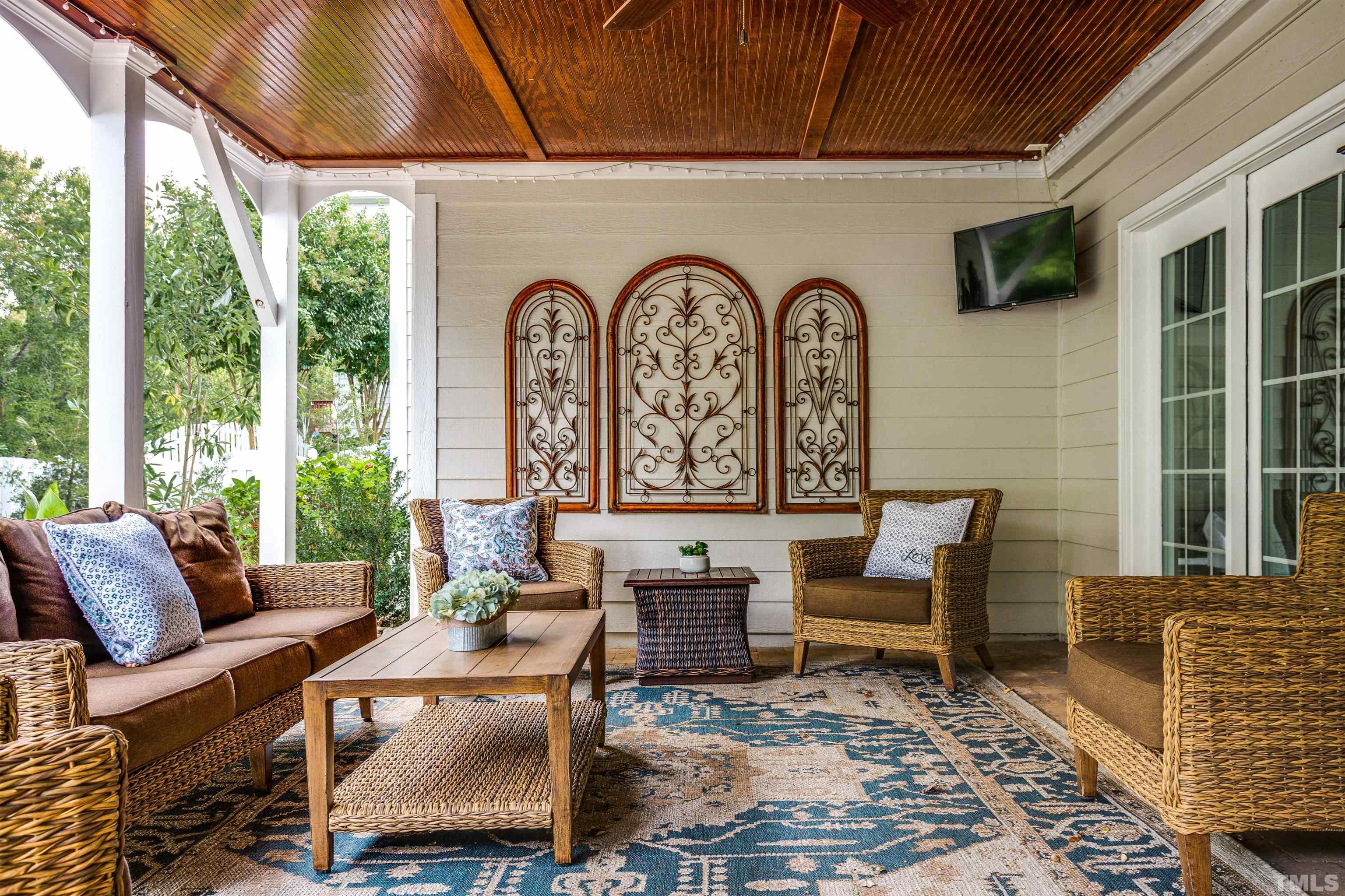 9004 Shellwood Court Raleigh, NC 27617 - Photo 26 of 30 a outdoor living space with furniture and a fireplace