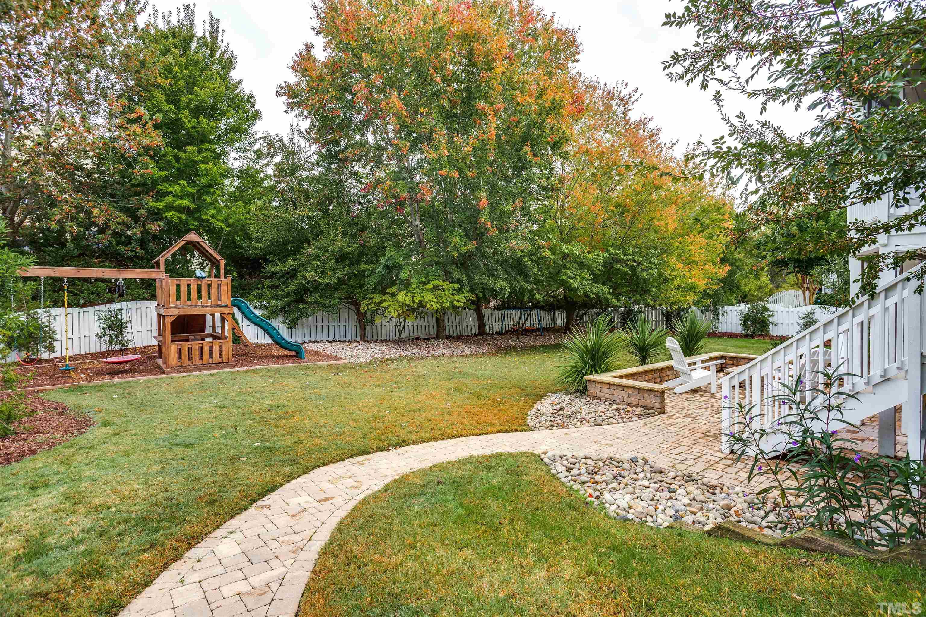 9004 Shellwood Court Raleigh, NC 27617 - Photo 27 of 30 a view of a house with a yard