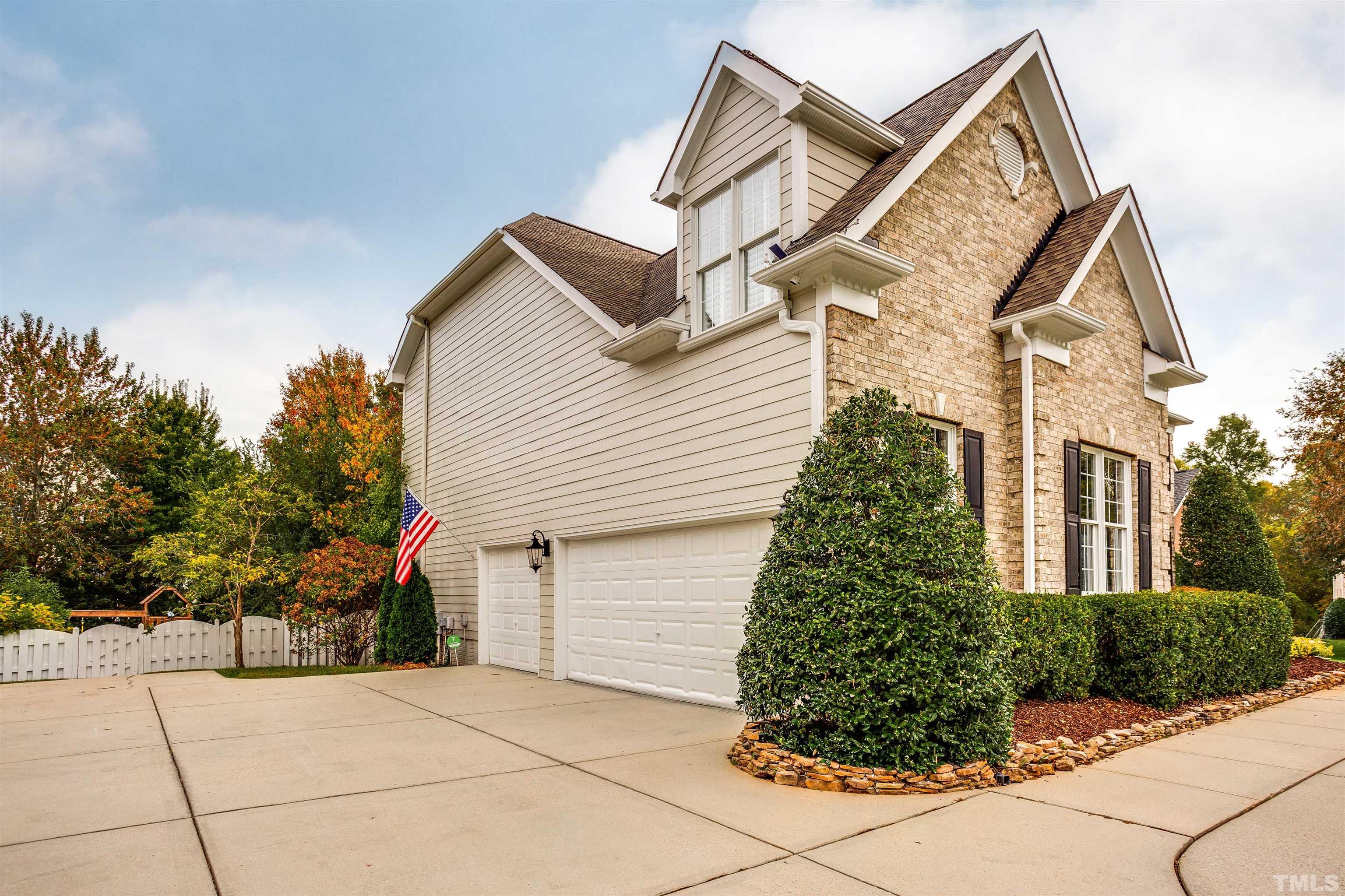 9004 Shellwood Court Raleigh, NC 27617 - Photo 30 of 30 a view of a house with a yard