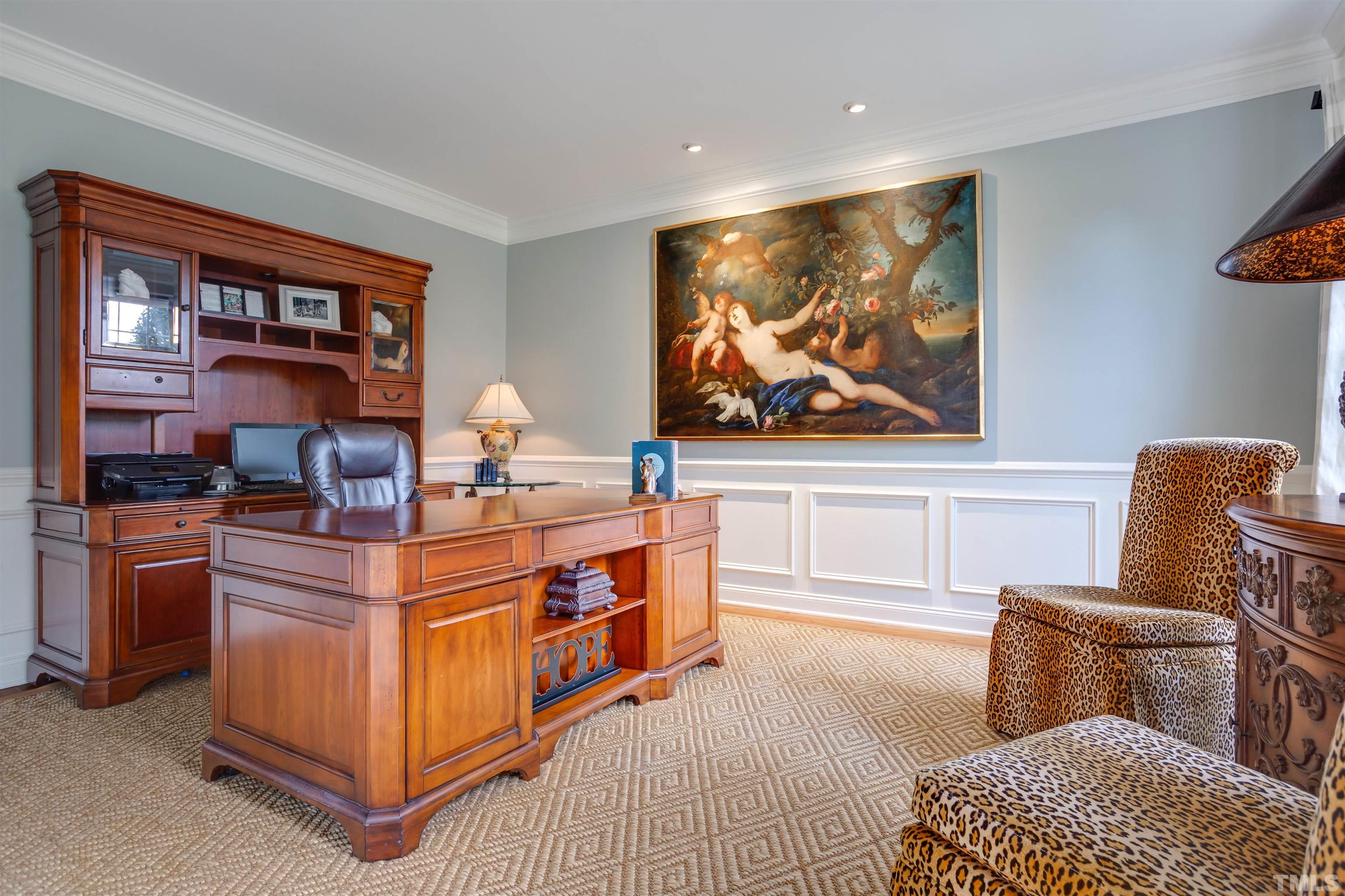 9004 Shellwood Court Raleigh, NC 27617 - Photo 9 of 30 a living room with stainless steel appliances kitchen island granite countertop furniture and a large window