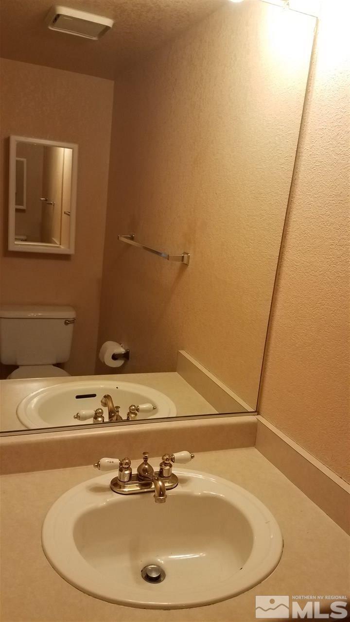 2620 Keystone Avenue Reno, NV 89503 - Photo 15 of 34 a bathroom with a sink and a mirror