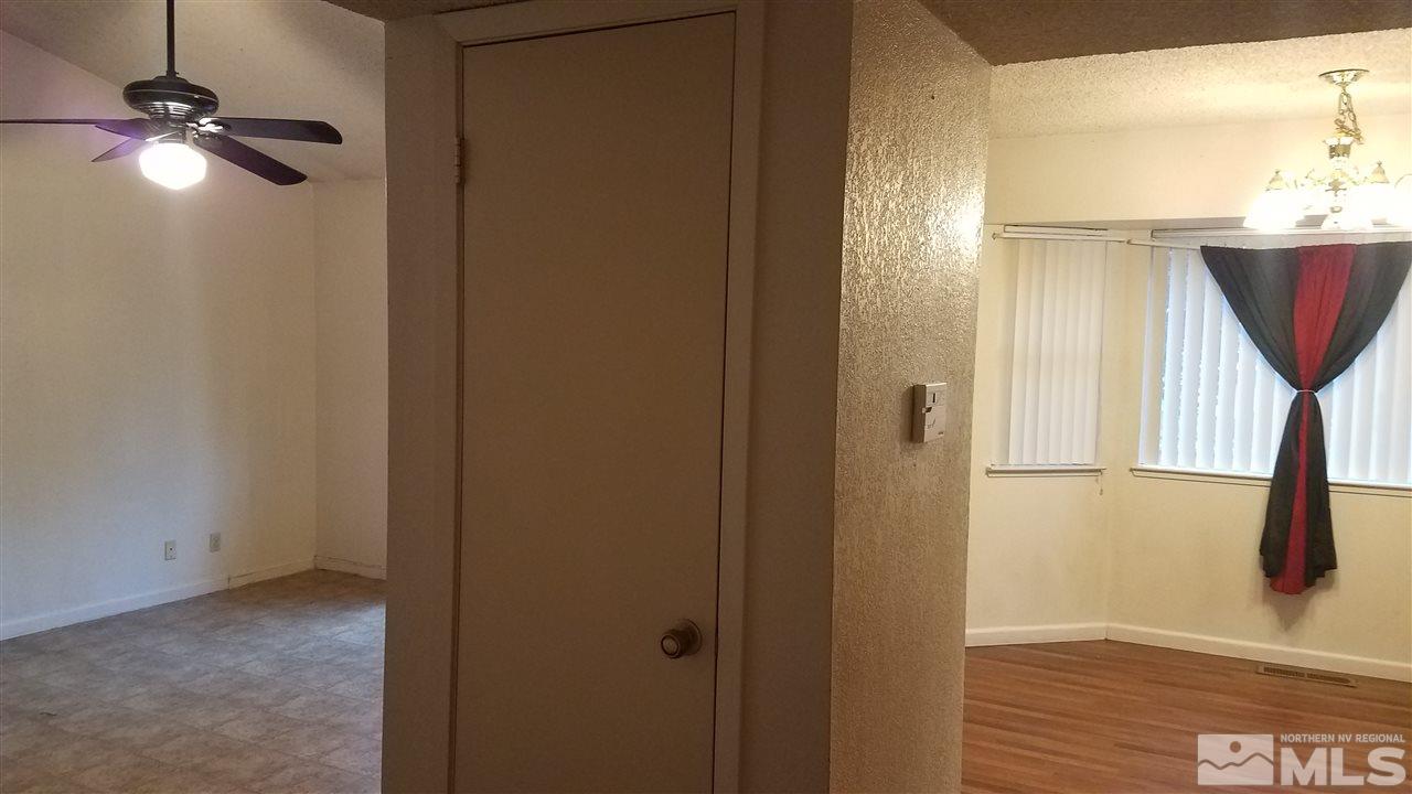 2620 Keystone Avenue Reno, NV 89503 - Photo 16 of 34 a view of an empty room with wooden floor and a window