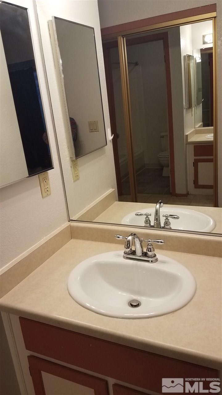 2620 Keystone Avenue Reno, NV 89503 - Photo 27 of 34 a bathroom with a sink and a mirror