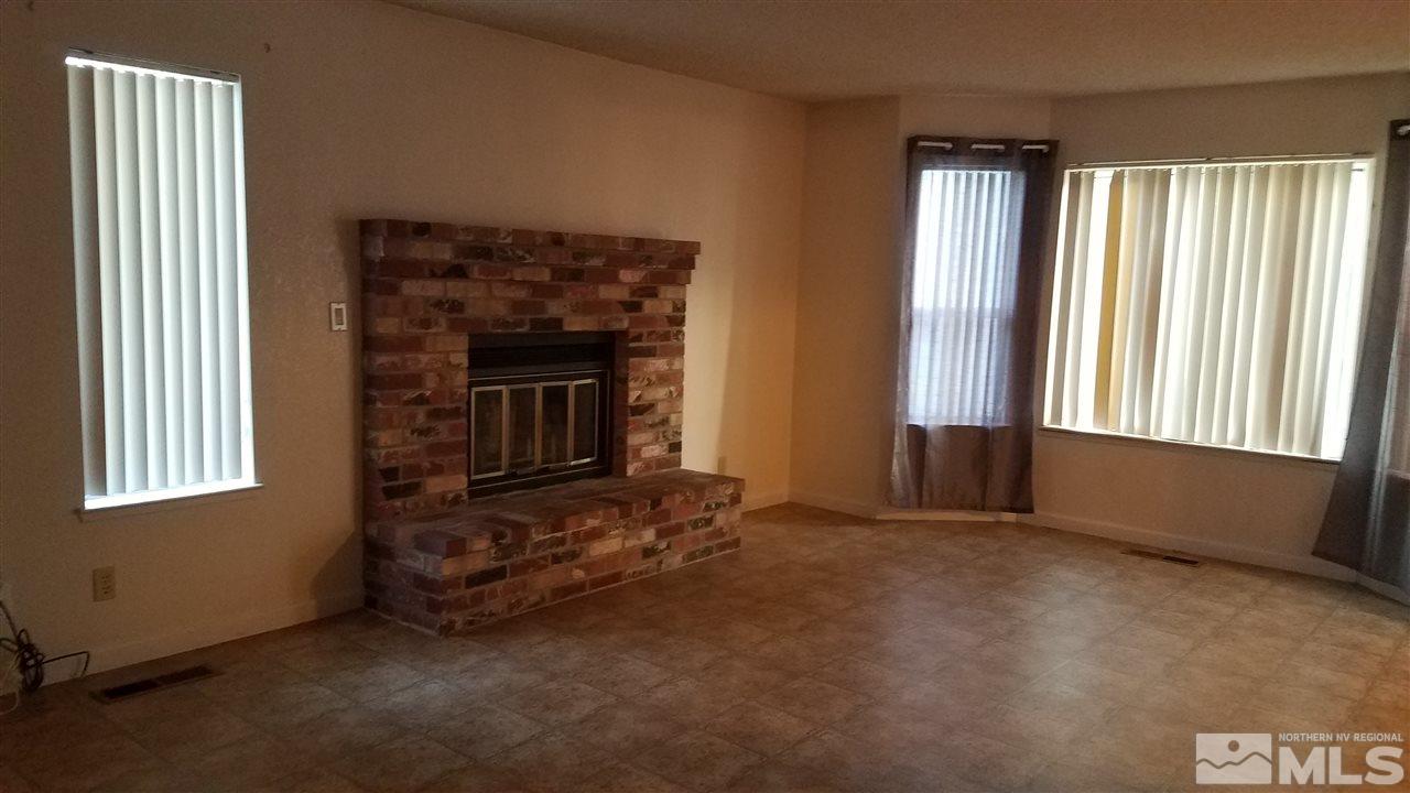 2620 Keystone Avenue Reno, NV 89503 - Photo 4 of 34 an empty room with windows