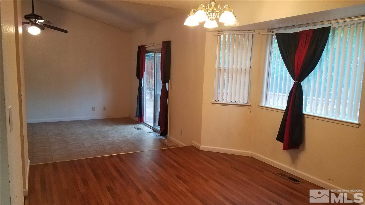 2620 Keystone Avenue Reno, NV 89503 - Photo 5 of 34 wooden floor in an empty room with a window