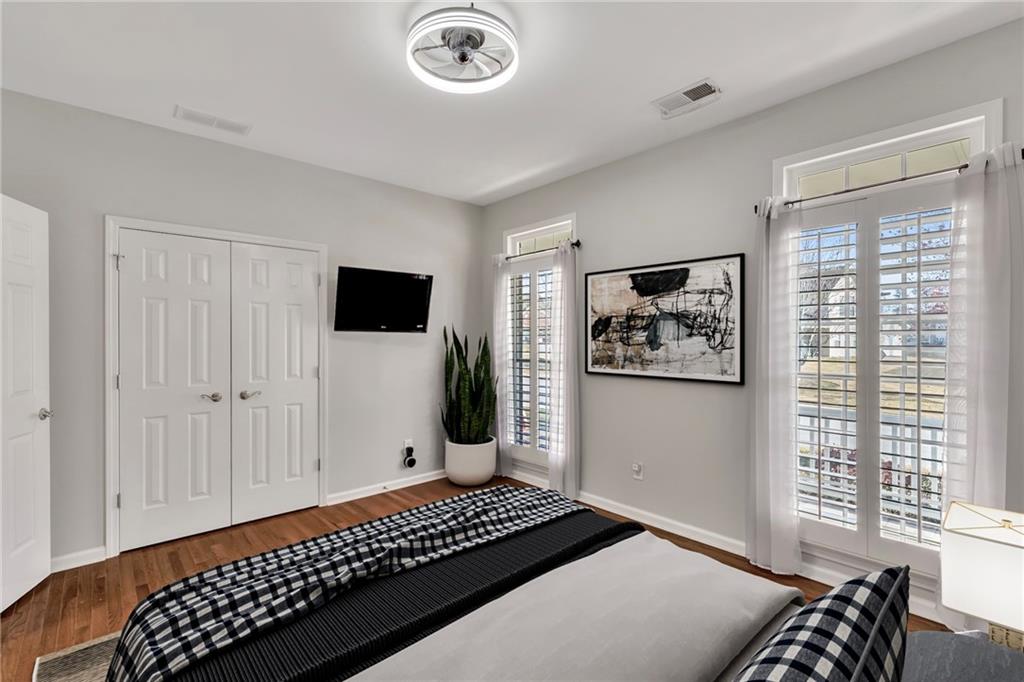 211 Graymist Path Southwest Loganville, GA 30052 - Photo 32 of 65 a bedroom with windows