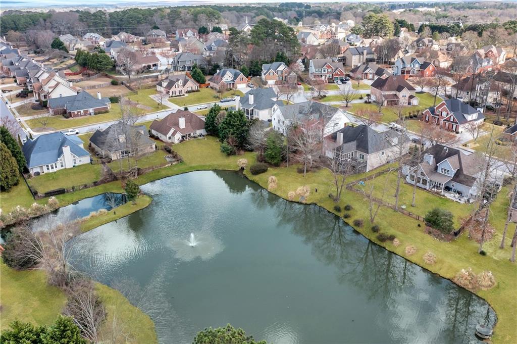 211 Graymist Path Southwest Loganville, GA 30052 - Photo 4 of 65 an aerial view of residential houses with outdoor space
