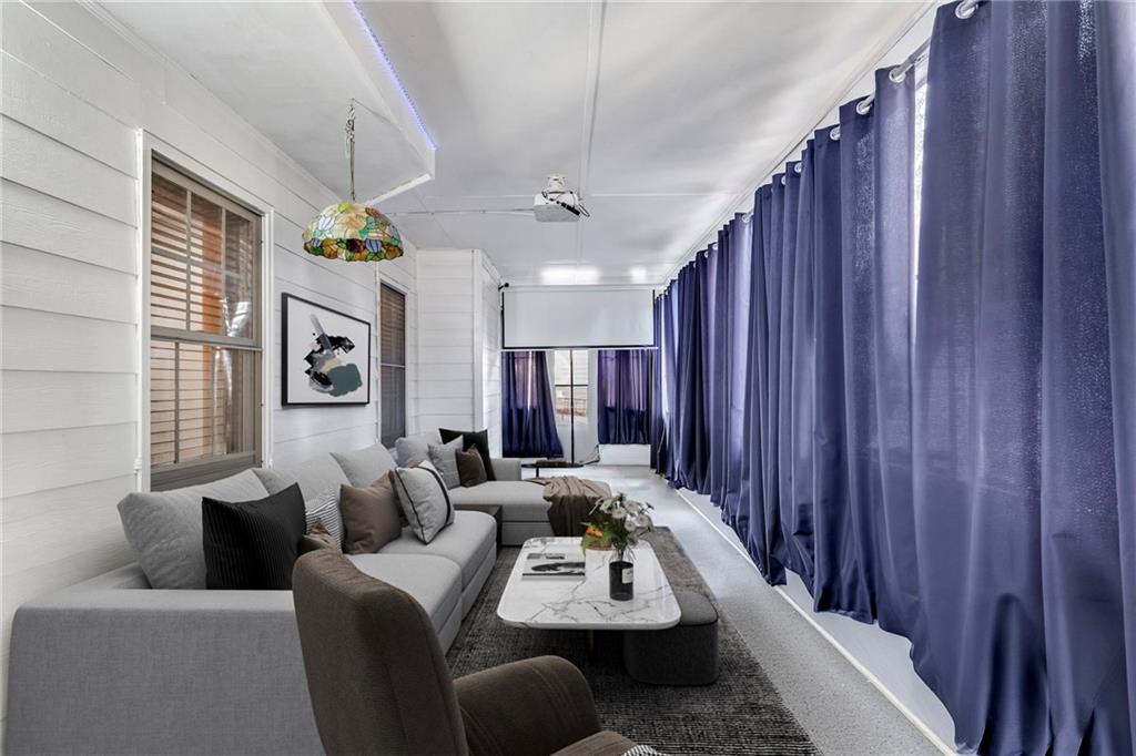 211 Graymist Path Southwest Loganville, GA 30052 - Photo 57 of 65 a view of a livingroom with furniture and window