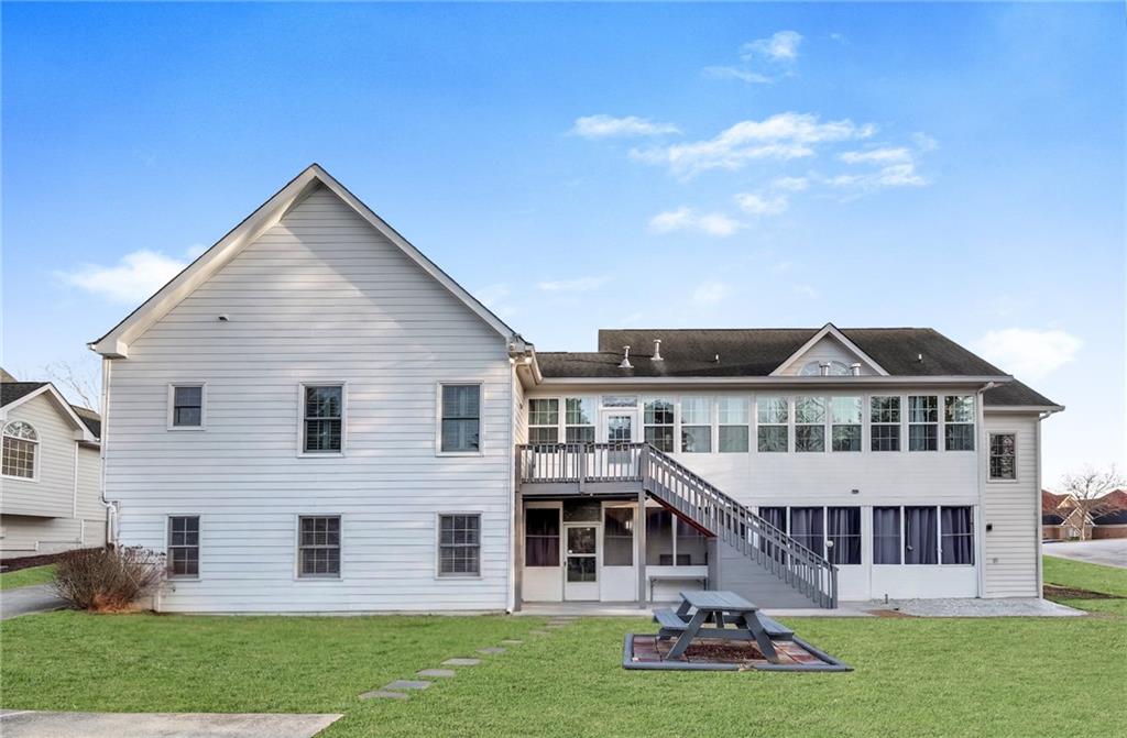 211 Graymist Path Southwest Loganville, GA 30052 - Photo 58 of 65 front view of a house with a yard