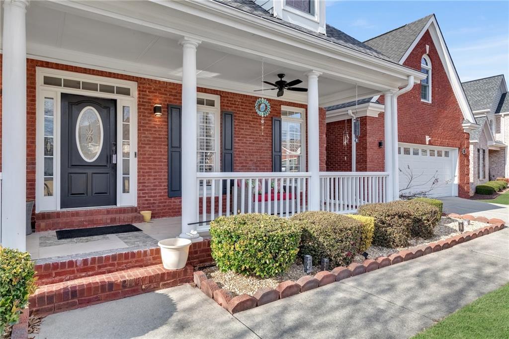 211 Graymist Path Southwest Loganville, GA 30052 - Photo 7 of 65 a view of a house with a small yard and wooden floor and fence