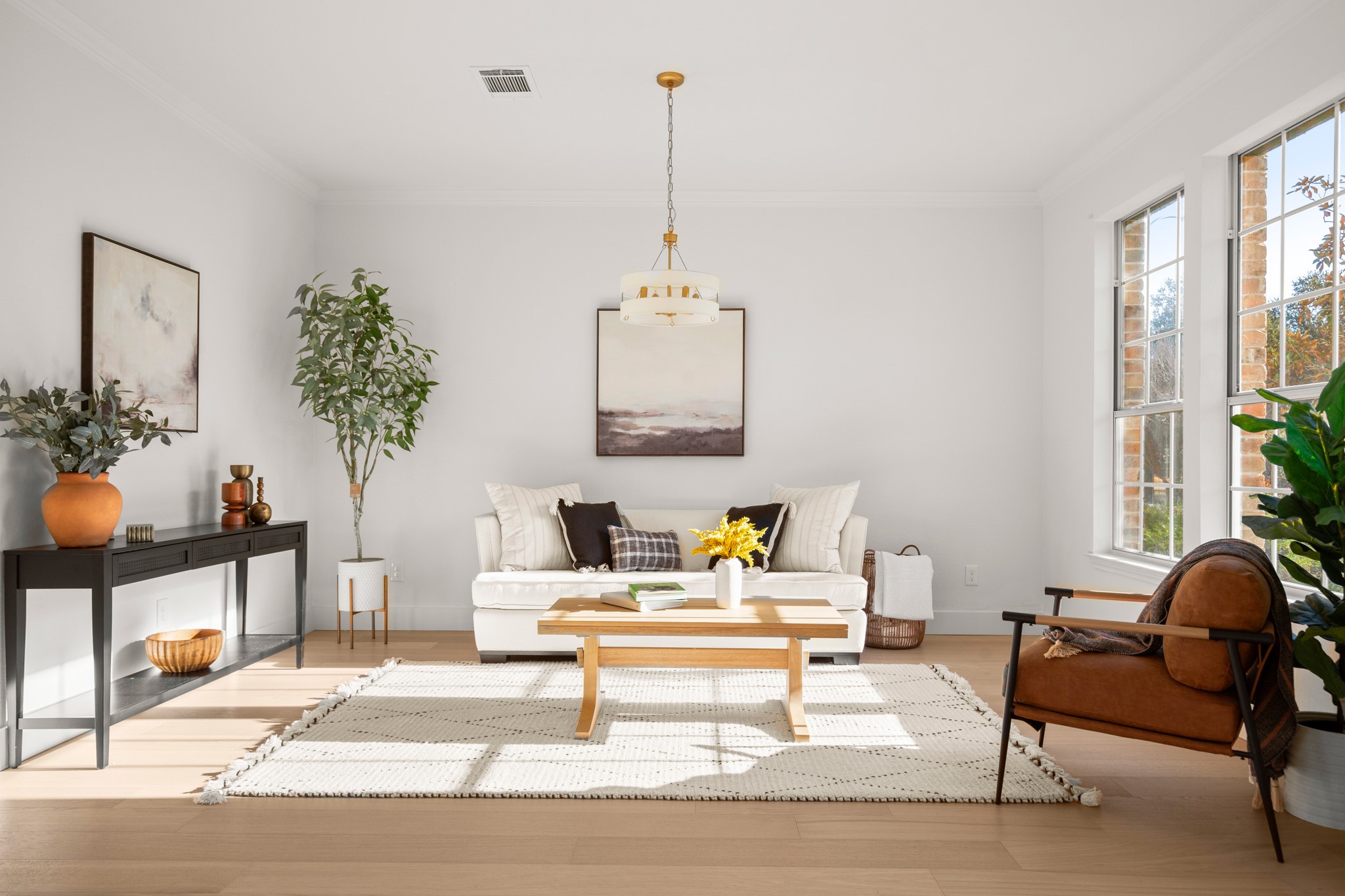 2022 Inverness Drive Round Rock, TX 78681 - Photo 1 of 38 a living room with furniture a window and flowerpot