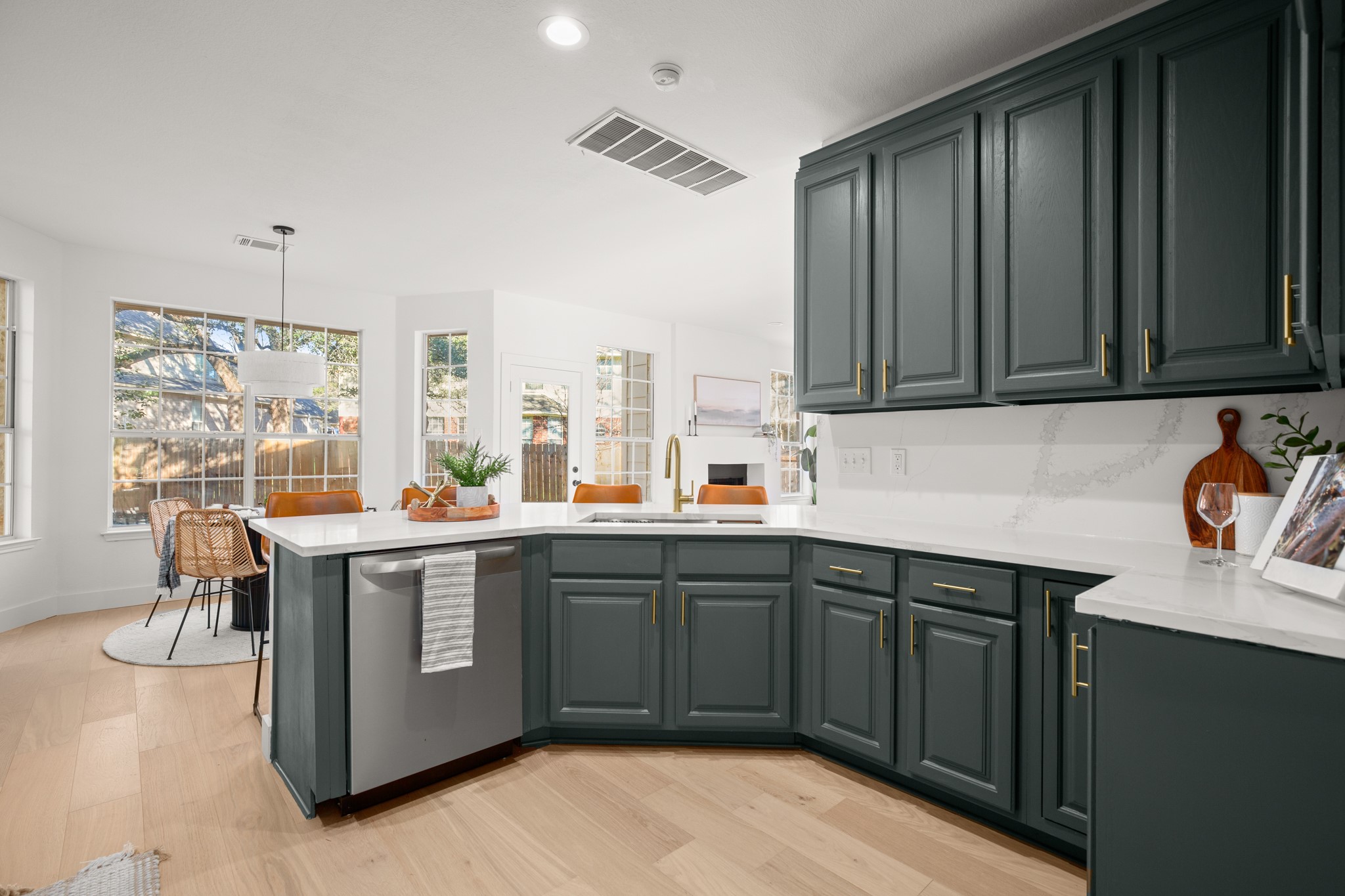 2022 Inverness Drive Round Rock, TX 78681 - Photo 17 of 38 a kitchen with a sink and cabinets