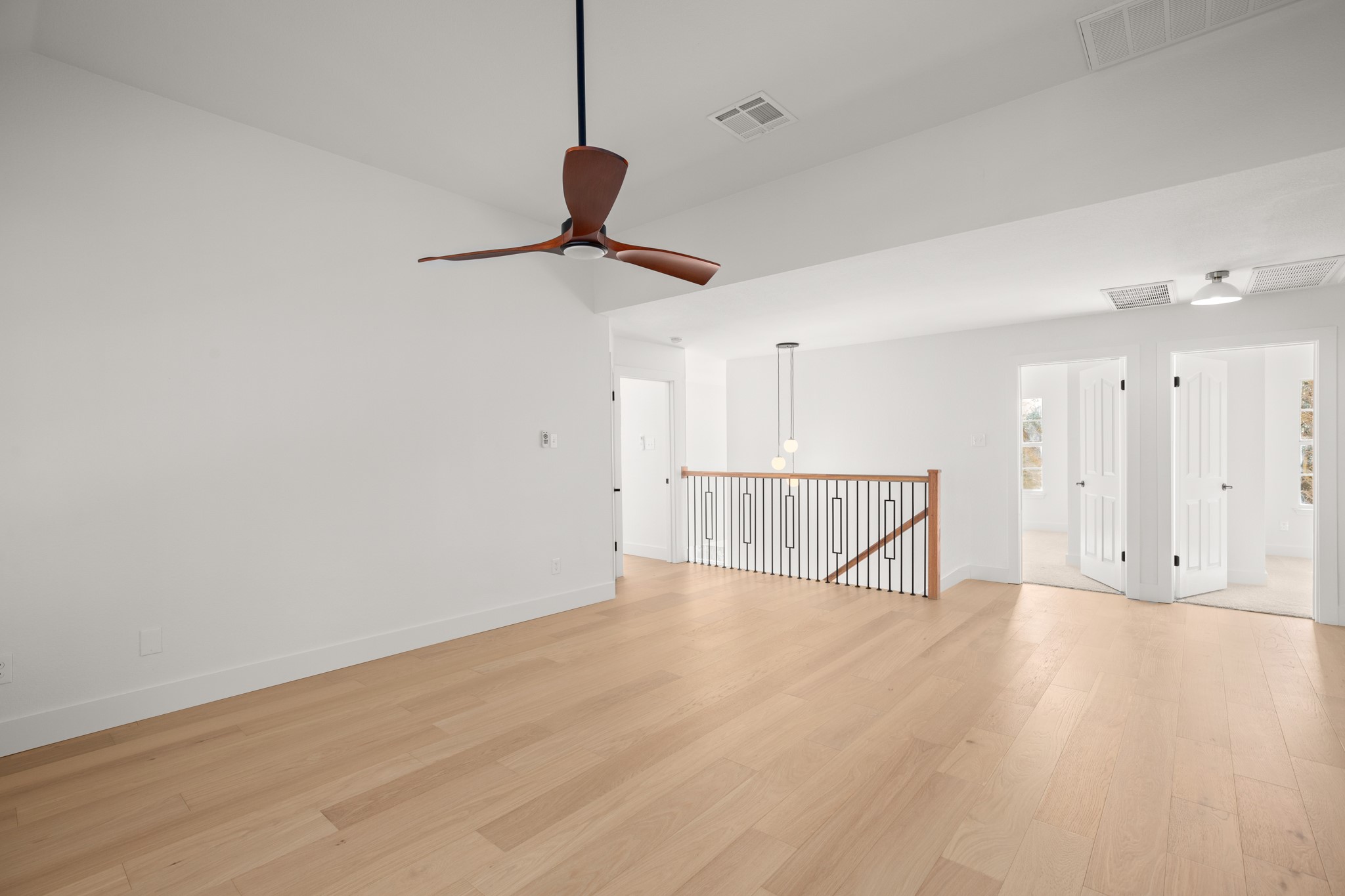 2022 Inverness Drive Round Rock, TX 78681 - Photo 29 of 38 a view of an empty room with wooden floor