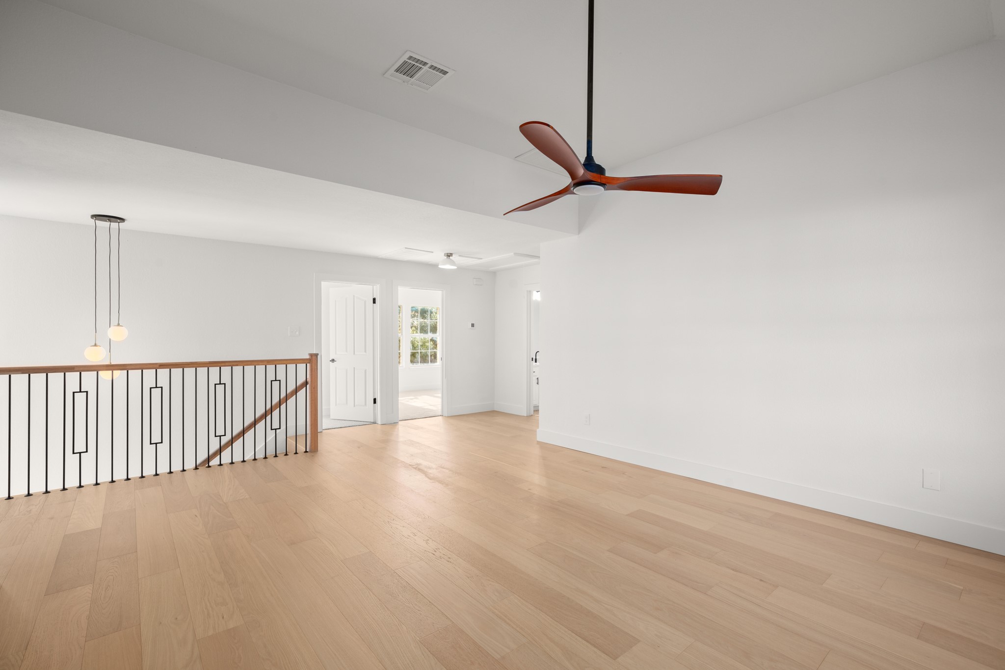 2022 Inverness Drive Round Rock, TX 78681 - Photo 30 of 38 a view of a hallway with wooden floor