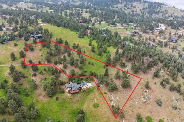 a view of a yard with an outdoor space