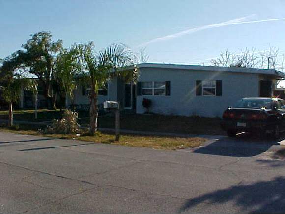 1066 Cable Palm Bay, FL 32905 - Photo 1 of 6 a view of back yard of the house