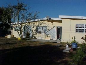 1066 Cable Palm Bay, FL 32905 - Photo 2 of 6 a view of a house with a yard
